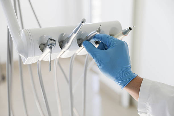 Professional Tooth Extraction technician working in Reed City, MI